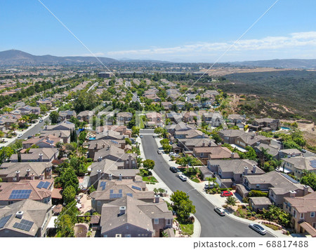 Aerial view of Torrey Santa Fe, middle class subdivision neighborhood with residential villas Aerial view of Torrey Santa Fe, middle class subdivision neighborhood with residential villas 68817488