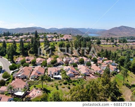 Aerial view of residential neighborhood in green valley 68817519
