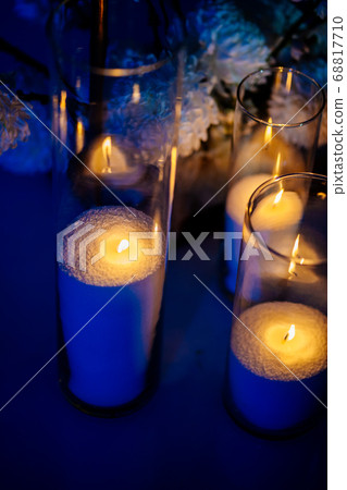 candles in glass glasses burning in the dark.  68817710
