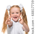Little girl with red hair on a white isolated background 68817739