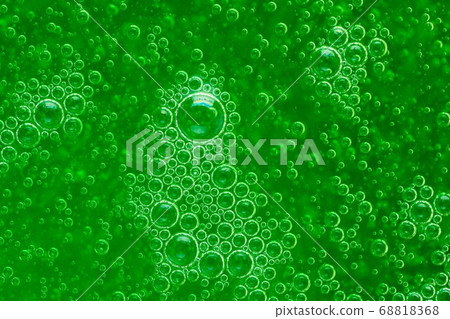 abstract liquid soap bubbles green background 68818368