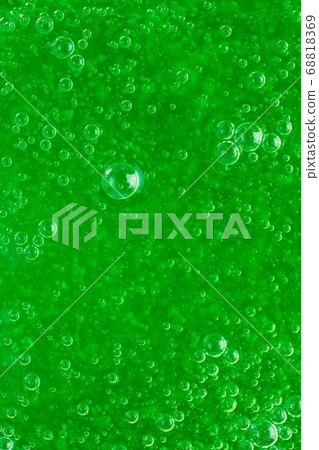 abstract liquid soap bubbles green background 68818369