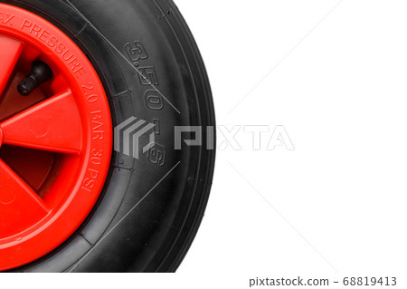 part of wheelbarrow wheel tire, white background part of wheelbarrow wheel tire, white background 68819413