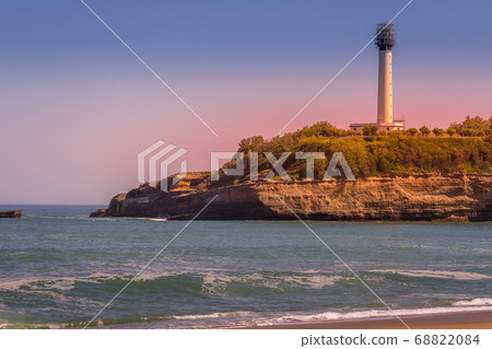 Beautiful colorful sunset in Biarritz view lighthouse sea background. 68822084