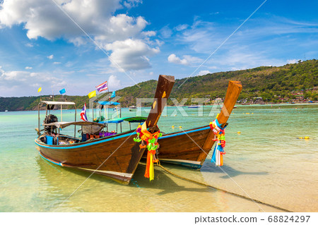 Traditional thai boat on Phi Phi Don Traditional thai boat on Phi Phi Don 68824297