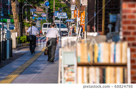 Tokyo Cityscape in Japan Kanda Jinbocho-A second-hand bookstore street lined with shops facing north gives a brief west day hit: August 25 Tokyo Cityscape in Japan Kanda Jinbocho-A second-hand bookstore street lined with shops facing north gives a brief west day hit: August 25 68824798