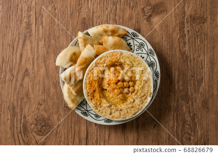 Hummus Middle Eastern food chickpeas and olive oil sauce (hummus) Hummus Middle Eastern food chickpeas and olive oil sauce (hummus) 68826679