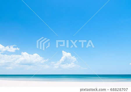 Tropical island white sand beach with blue sky and Tropical island white sand beach with blue sky and 68828707