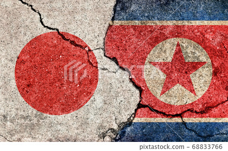 International conflict / political conflict / dirty flag illustration (Japan vs. North Korea) / cracked concrete wall 68833766