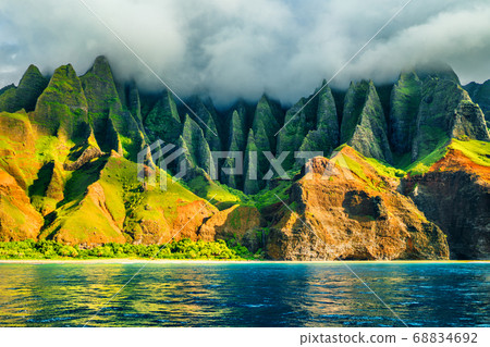 Na Pali coast, Kauai, Hawaii view from sea sunset cruise tour. Nature coastline landscape in Kauai island, Hawaii, USA. Hawaii travel. 68834692