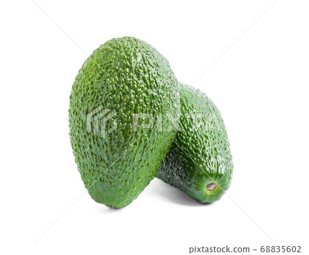Ripe avocados isolated on white background. 68835602