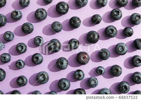 Fresh berries on color background, close up 68837522
