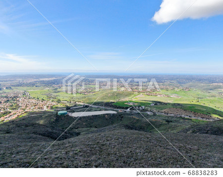 View from the top of the Black Mountain of Carmel Valley suburban neighborhood on the background. View from the top of the Black Mountain of Carmel Valley suburban neighborhood on the background. 68838283