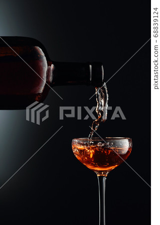 Strong golden alcoholic drink from the antique 68839124