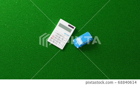CG photorealistic illustration of a car toy and calculator placed on a plane CG photorealistic illustration of a car toy and calculator placed on a plane 68840614