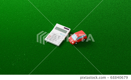 CG photorealistic illustration of a car toy and calculator placed on a plane 68840679