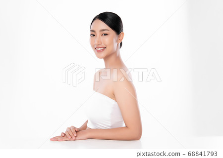 Beautiful Young asian Woman with Clean Fresh Skin, on white background, Face care, Facial treatment. Beautiful Young asian Woman with Clean Fresh Skin, on white background, Face care, Facial treatment. 68841793