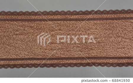color straight strip of lace fabric on a gray color straight strip of lace fabric on a gray 68841930