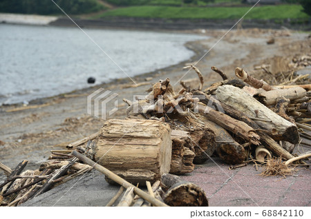 Floats and garbage washed up at the beach Floats and garbage washed up at the beach 68842110