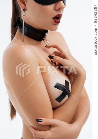 Sensual slim woman in black mask and collar Sensual slim woman in black mask and collar 68842887