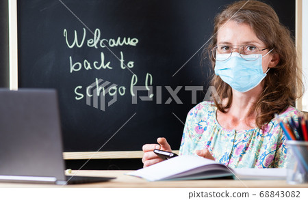 teacher wearing face mask back to school during 68843082