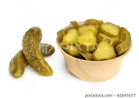 Marinated pickled cucumber in wooden bowl isolated on white background with clipping path and full depth of field 68845677