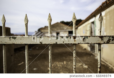 Old rusty metal fence Old rusty metal fence 68846974