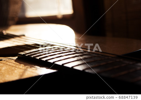 Acoustic Guitar In Music Studio Close up. Shined By The Sun 68847139
