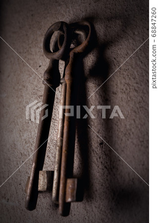 Old Rusted Keys Hanging On The Wall 68847260