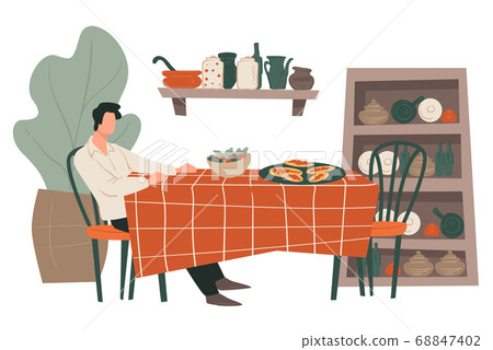 Man sitting by table at restaurant waiting for date 68847402