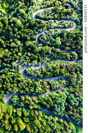 Winding road in Carpathian Mountains, Romania Winding road in Carpathian Mountains, Romania 68848333