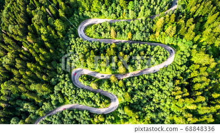 Winding road in Carpathian Mountains, Romania Winding road in Carpathian Mountains, Romania 68848336