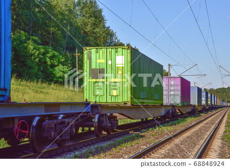 Cargo Containers Transportation On Freight Train By Railway Cargo Containers Transportation On Freight Train By Railway 68848924