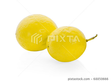 Yellow passion fruit isolated on white background. Yellow passion fruit isolated on white background. 68850666