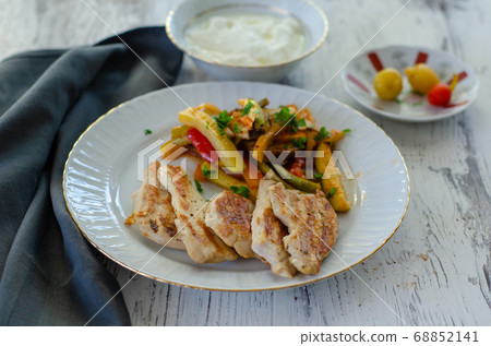 Grilled chicken and vegetables on the white Grilled chicken and vegetables on the white 68852141
