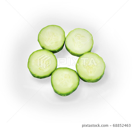 cut green cucumber isolated on white background 68852463