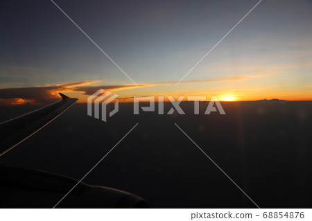 Horizon image that consists of the sun and clouds. Horizon image that consists of the sun and clouds. 68854876