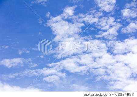 Clear blue color sky with white cloud background 68854997