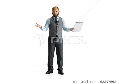Cheerful handsome businessman isolated over white studio background Cheerful handsome businessman isolated over white studio background 68857668