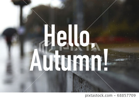 Urban landscape in the rain. Drops on the parapet along the sidewalk Urban landscape in the rain. Drops on the parapet along the sidewalk 68857709