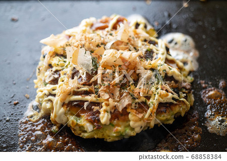 Okonomiyaki, japanese teppan-yaki pancake Okonomiyaki, japanese teppan-yaki pancake 68858384