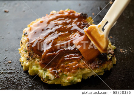 Okonomiyaki, japanese teppan-yaki pancake Okonomiyaki, japanese teppan-yaki pancake 68858386