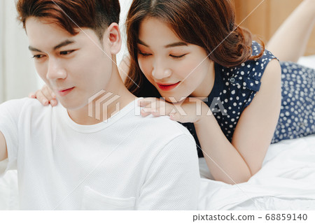 Couple in bed Couple in bed 68859140