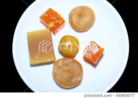 Indian sweets served in white plate. Halwa, Indian sweets served in white plate. Halwa, 68860077