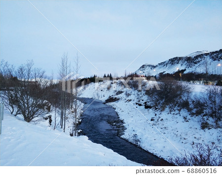River on the plain in Iceland. The banks are River on the plain in Iceland. The banks are 68860516