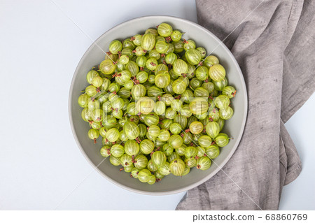 Green gooseberry isolated on white background Green gooseberry isolated on white background 68860769