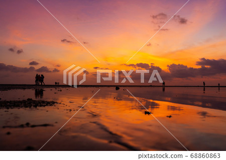 Burning bright sky during sunset on a tropical 68860863