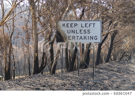 Damaged road signs in the bushfires in The Blue Mountains in Australia Damaged road signs in the bushfires in The Blue Mountains in Australia 68861047