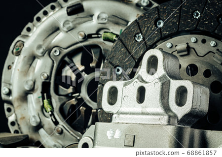 Close up of new car parts on black background 68861857