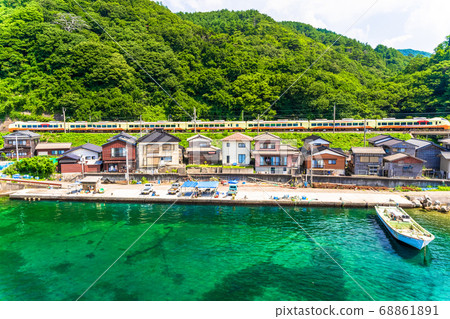 Summer Wakikawa Fishing Port and Limited Express Inaho Murakami City, Niigata Prefecture Summer Wakikawa Fishing Port and Limited Express Inaho Murakami City, Niigata Prefecture 68861891